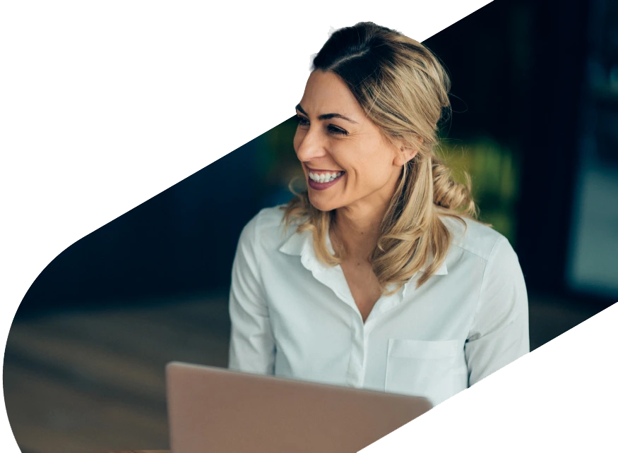 Woman smiling with laptop